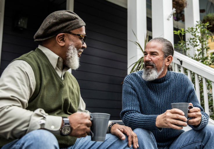2-men-talking-on-porch