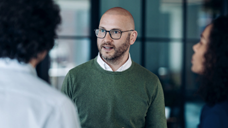 Small group of business people talking on a meeting