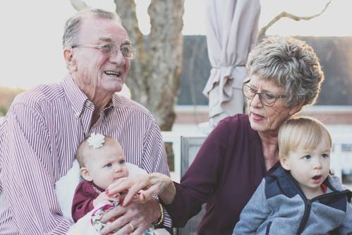 Older couple with grandchildren